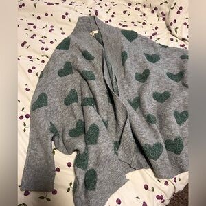 Cute cardigan,bat-wing sleeve, grey with green hearts on it.